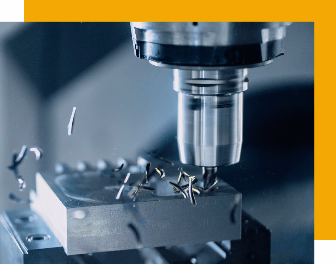 Worker wearing protective gloves holding a finished metal component at Hohman Plating - DataYard helped with modernizing manufacturing infrastructure with cloud migration