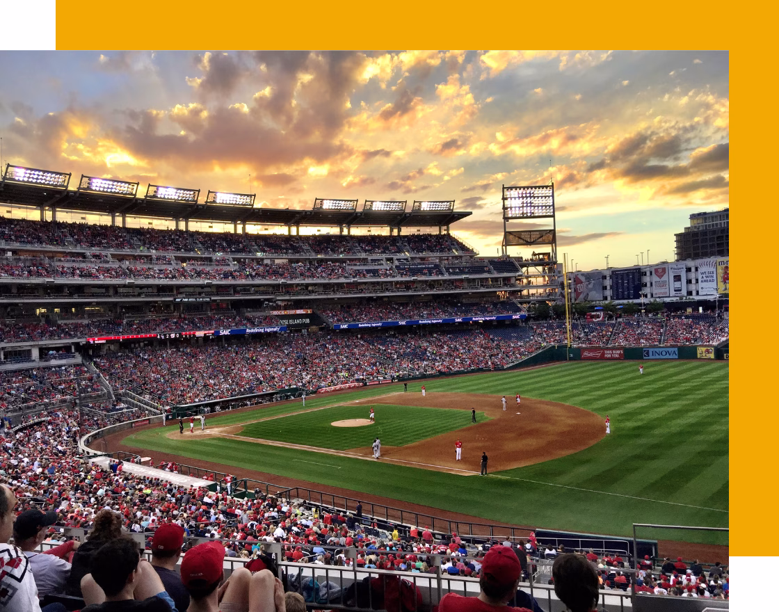 Packed baseball stadium during a high-traffic college baseball game for D1Baseball.com